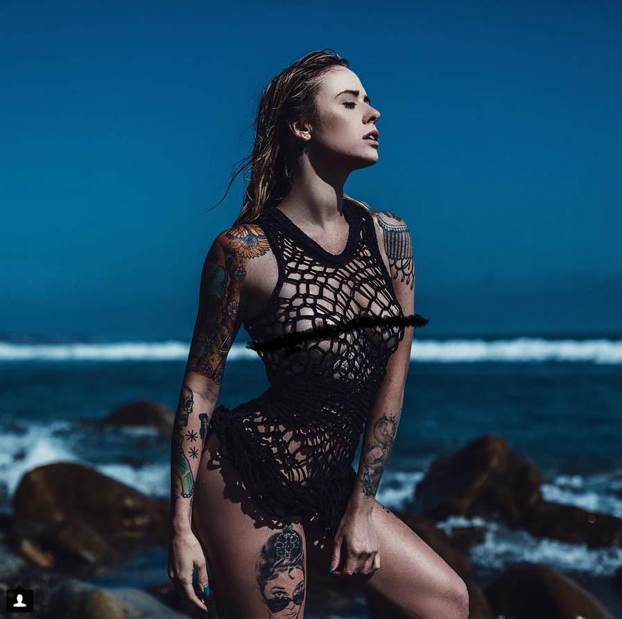 alysha nett, female model, woman on beach in front of coastline