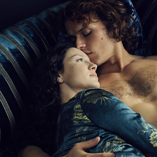 sam heughan, outlander, couple laying in bed
