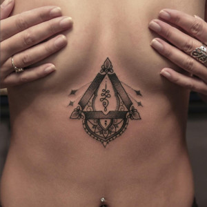bang bang, chest tattoo on women's sternum