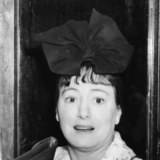 dorothy parker black and white portrait of her with a big bow on her head