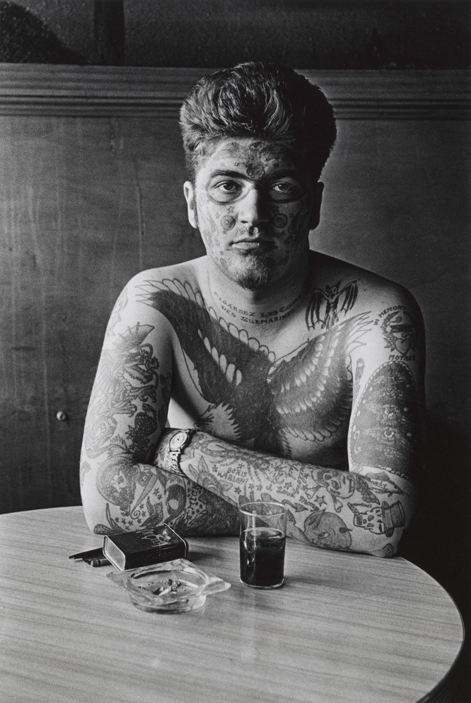 Diane Arbus. Jack Dracula at a bar, New London, Conn. 1961. ©The Estate of Diane Arbus, LLC. All Rights Reserved