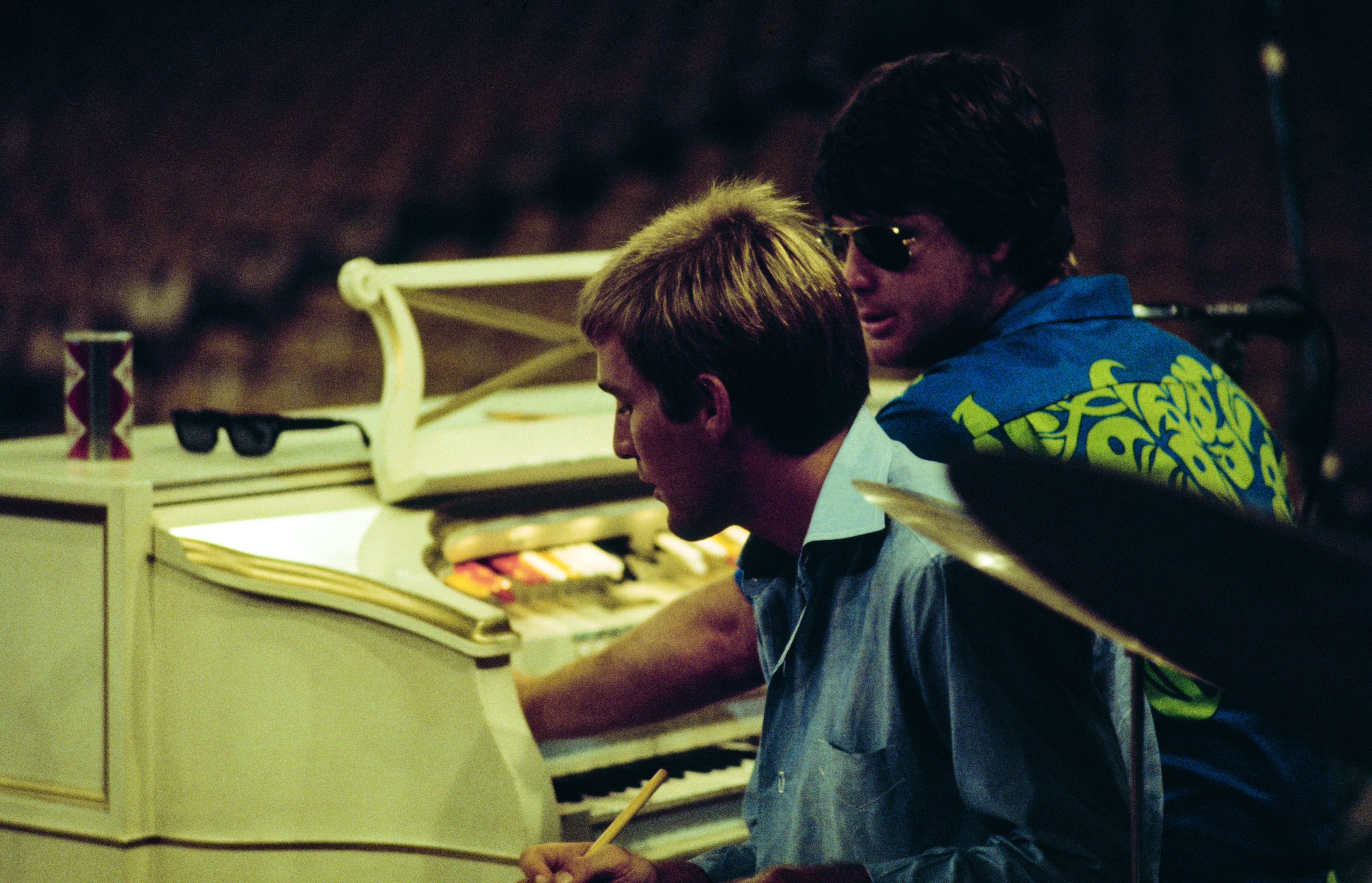 Beach Boys Dennis and Brian Wilson rehearsing for a concert in Hawaii. Honolulu International Center, August 25, 1967. © Capitol Photo Archives.