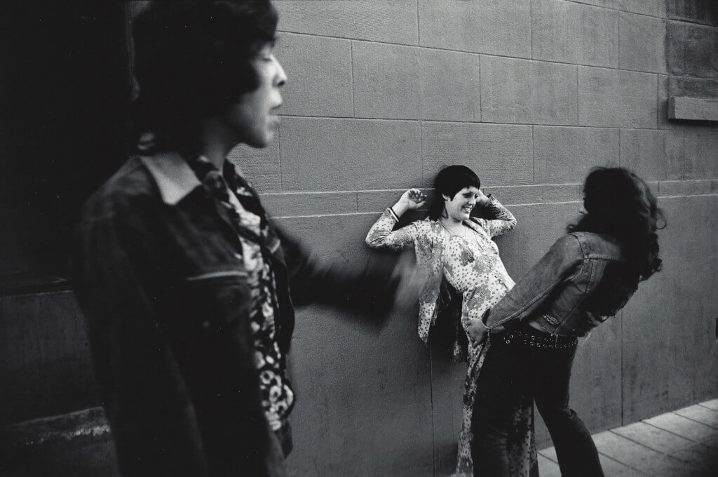 Couple Grinding, Hollywood Boulevard, Los Angeles, 1970. Vintage gelatin silver print. 11 x 14”. 