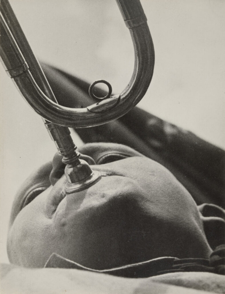 Pioneer with a Bugle (1930) by Aleksandr Rodchenko. Gelatin silver print, 9 1/4 x 7 1/16 inches. The Museum of Modern Art, New York. Gift of the Rodchenko Family. 