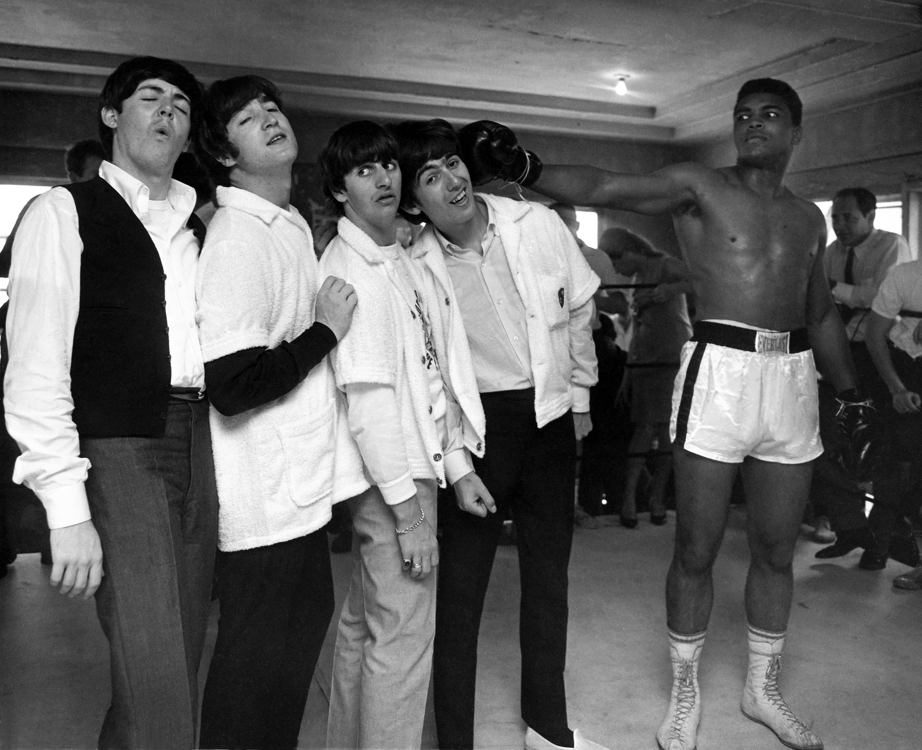 The Beatles and Muhammad Ali in HARRY BENSON: SHOOT FIRST, a Magnolia Pictures release. Photo courtesy of Magnolia Pictures. Photo Credit: © Harry Benson.