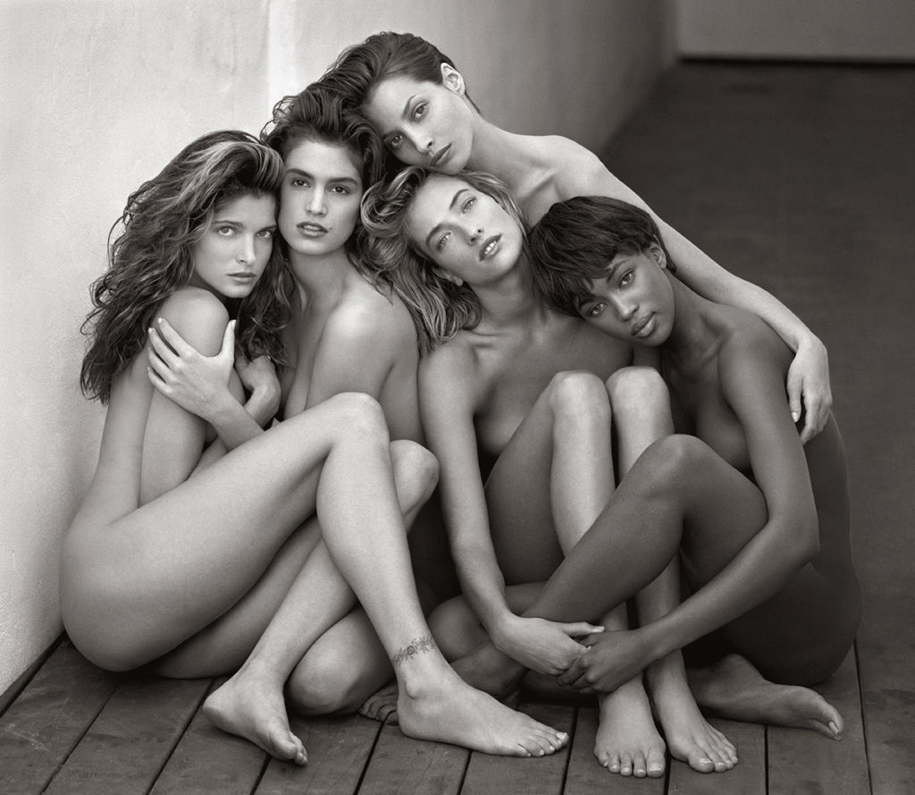 5 nude women embrace by Herb Ritts