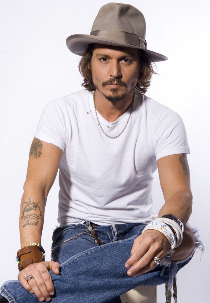 johnny depp wearing a fedora and classic white t-shirt