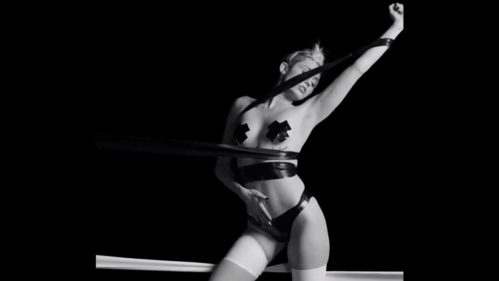Miley Cyrus in a sexy provocative S&M scene in a Quentin Jones Film