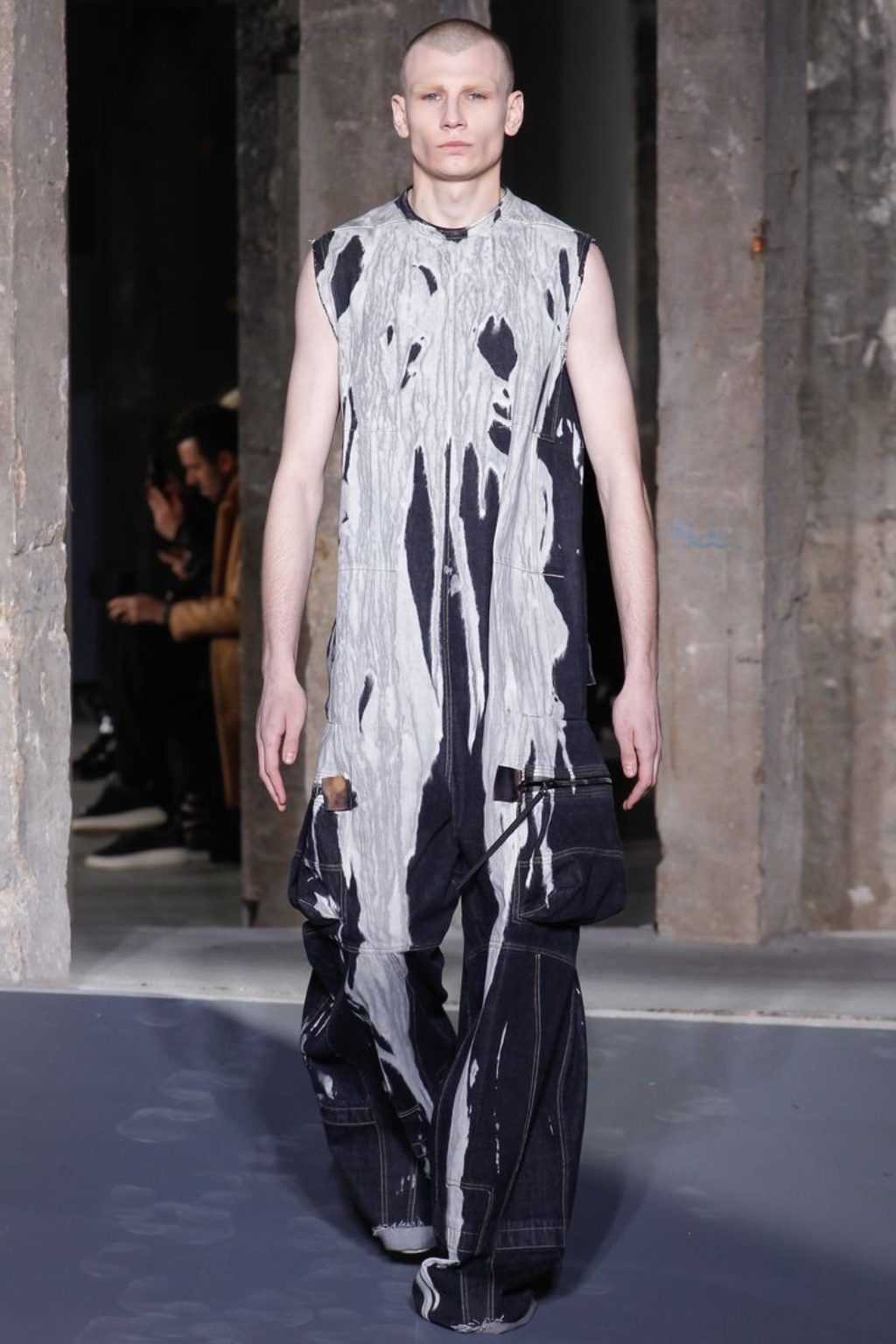 Rick Owens Male Model Wearing sleeveless long garment with white paint dripping down its front, Rick Owens Runway Fall 2017