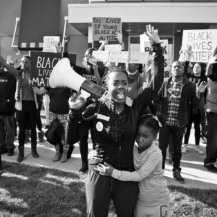 Whose Streets bullhorn scene