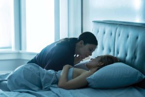 Photograph of Anna’s character Erica Myles in The Girlfriend Experience Season 2 in bed with escort Anna Garner.