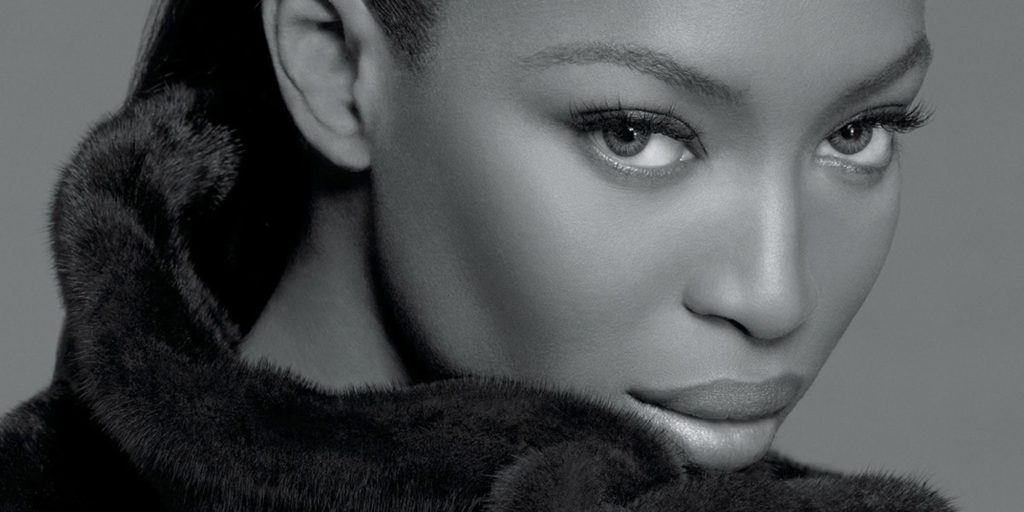 Black and White Photograph of Naomi Campbell's Beautiful Face With a Luxurious Fur Collar