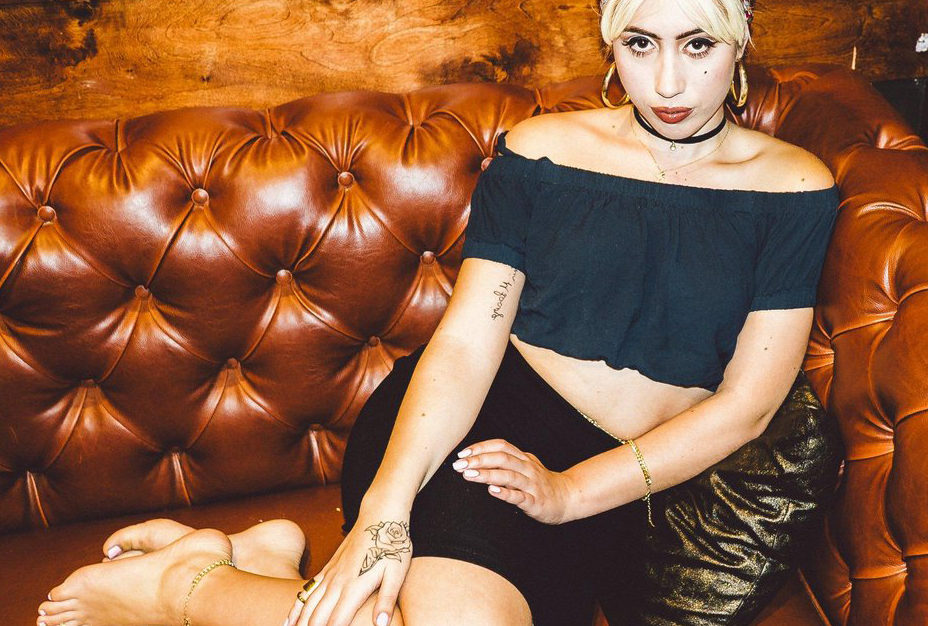 Kali sitting on leather couch