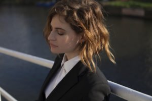 Christine Aguilera white shirt black jacket