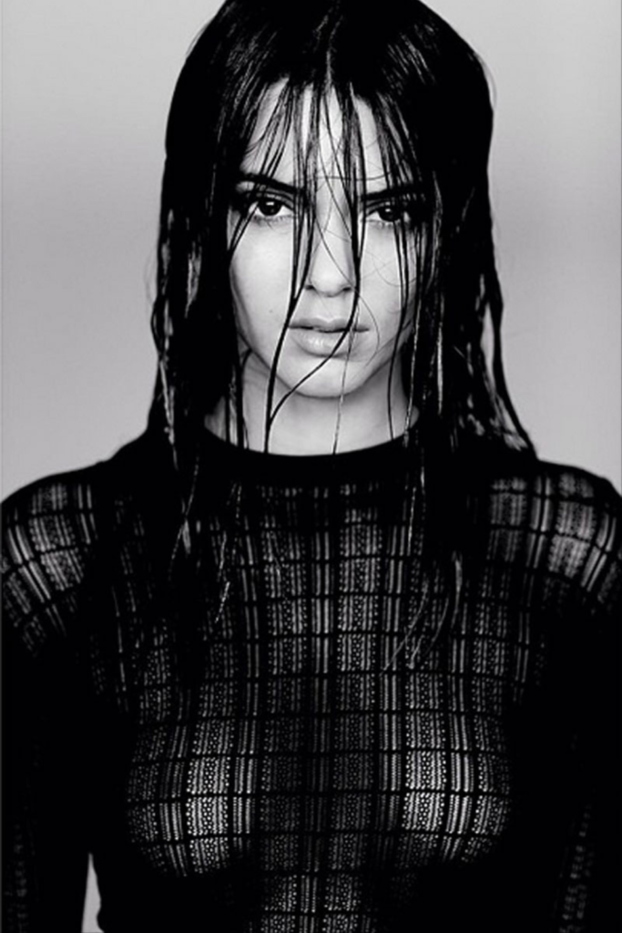 Sexy black and white photograph of Kendall James wearing a see-through shirt by photographer Russell James