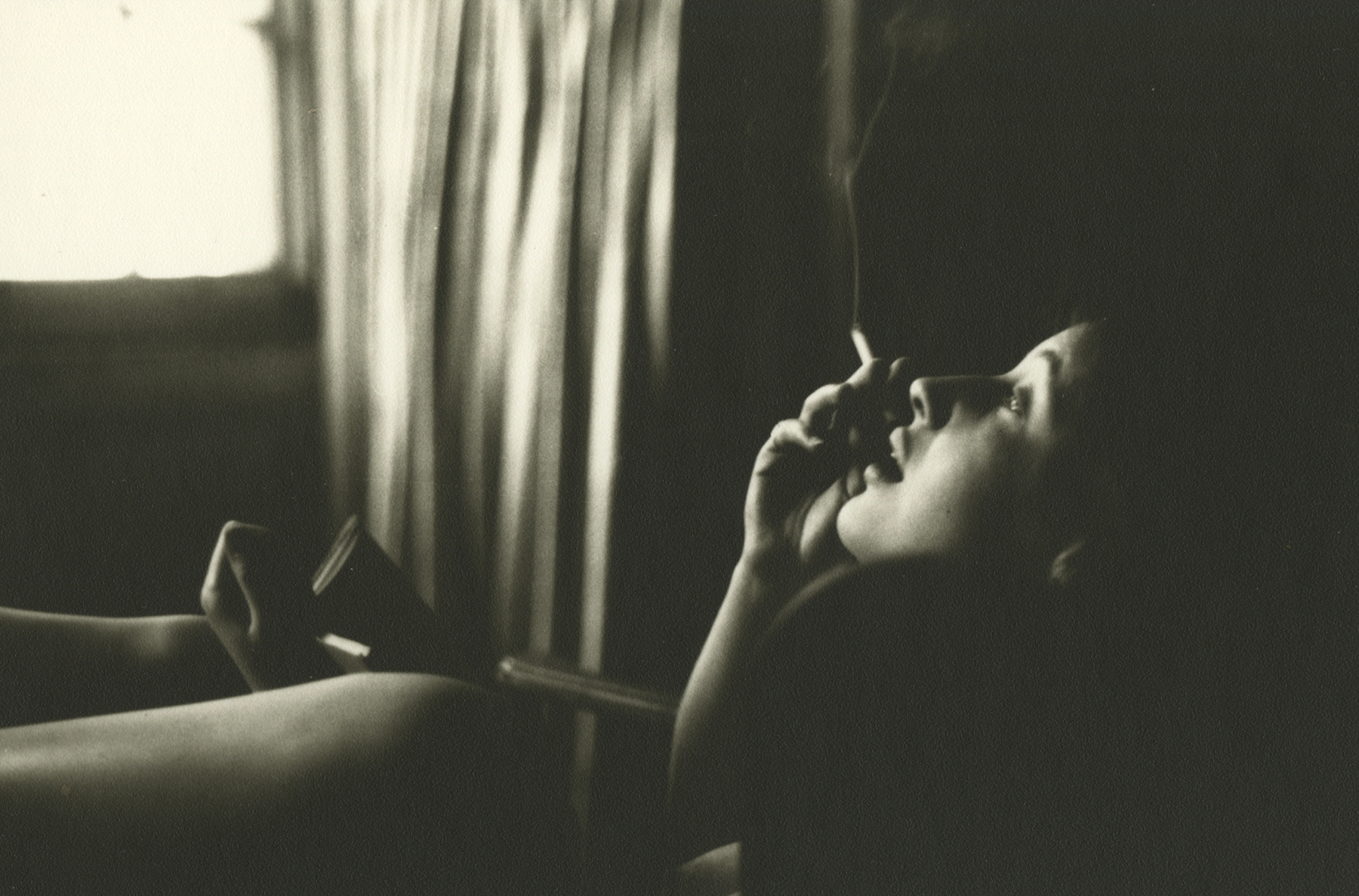 Saul Leiter woman smoking