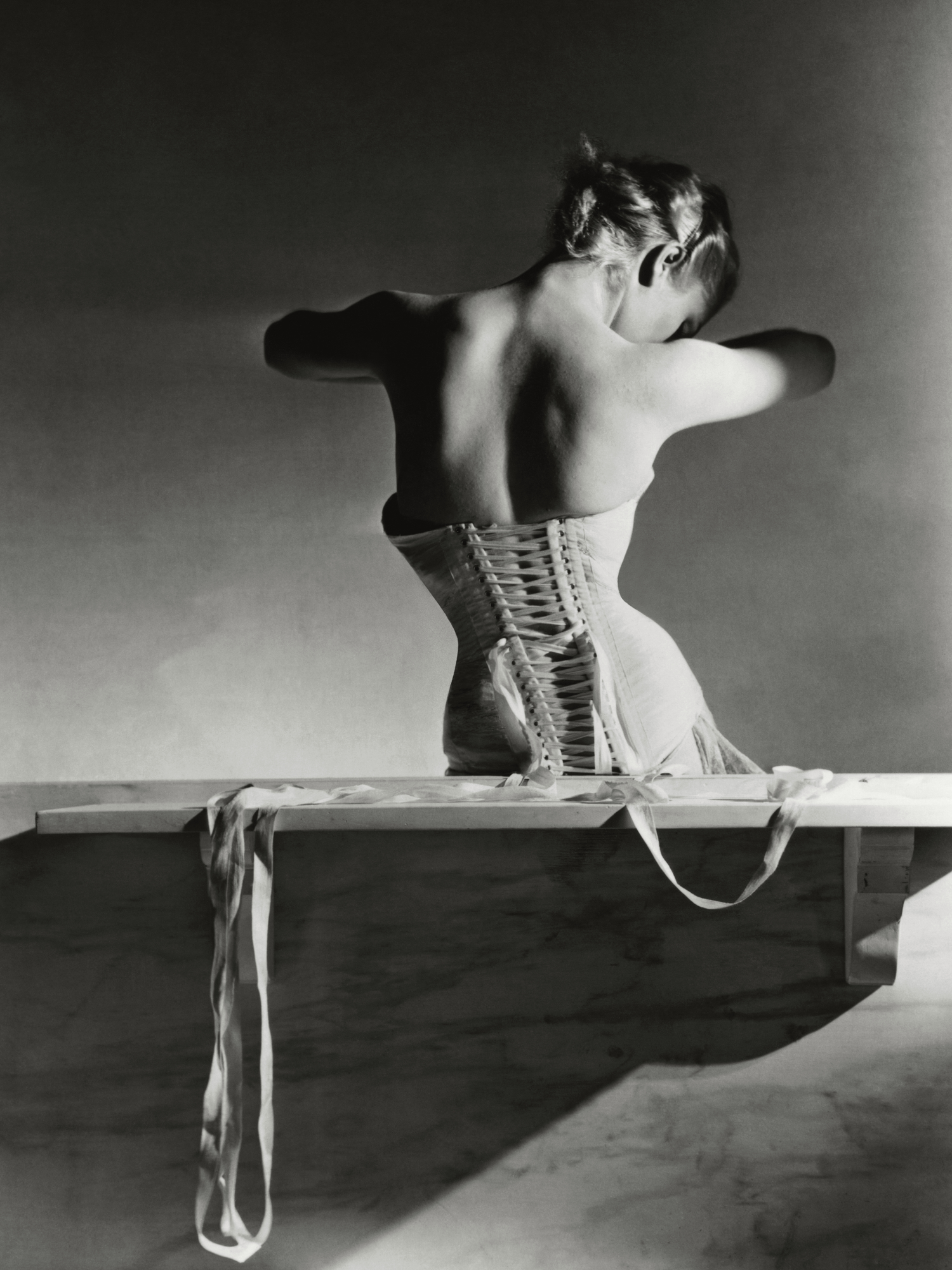 Woman's back in Vintage Corset