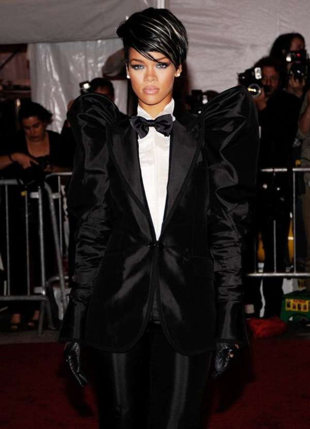 Rhianna in black tuxedo and gloves