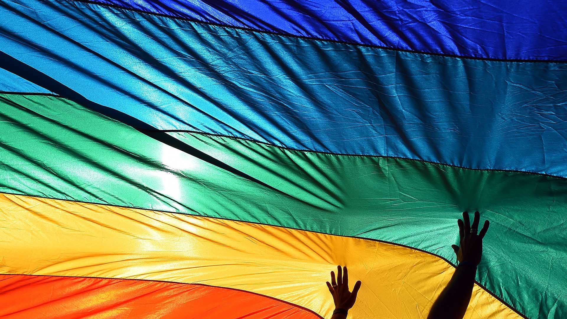 rainbow flag with hands
