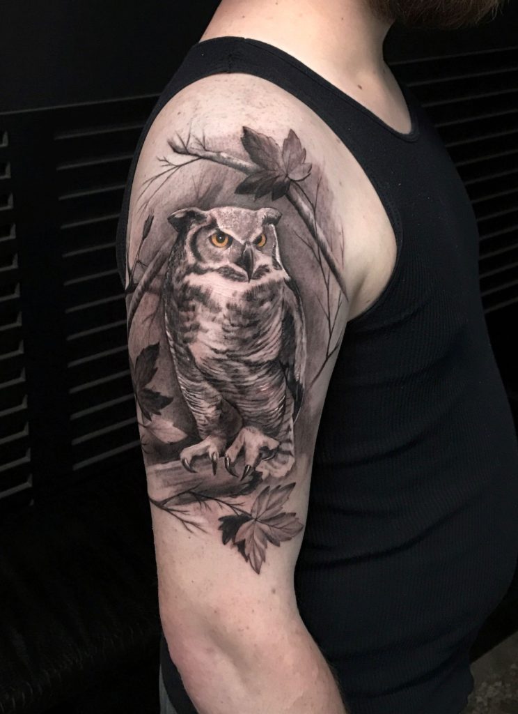 The most amazing tattoo of an owl on a man's arm by tattoo artist bang bang