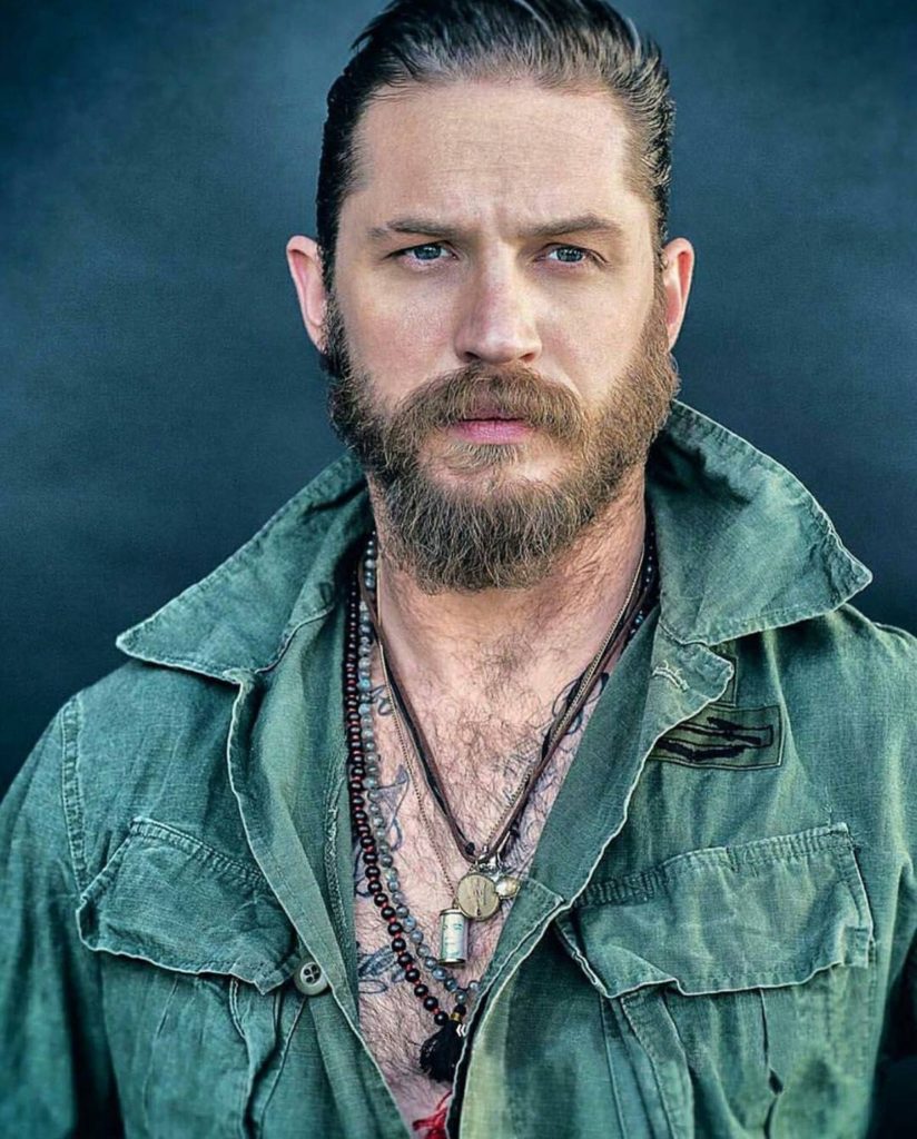 Actor Tom Hardy Looking Sexy and Rugged in Green Army Jacket and Cool Necklaces