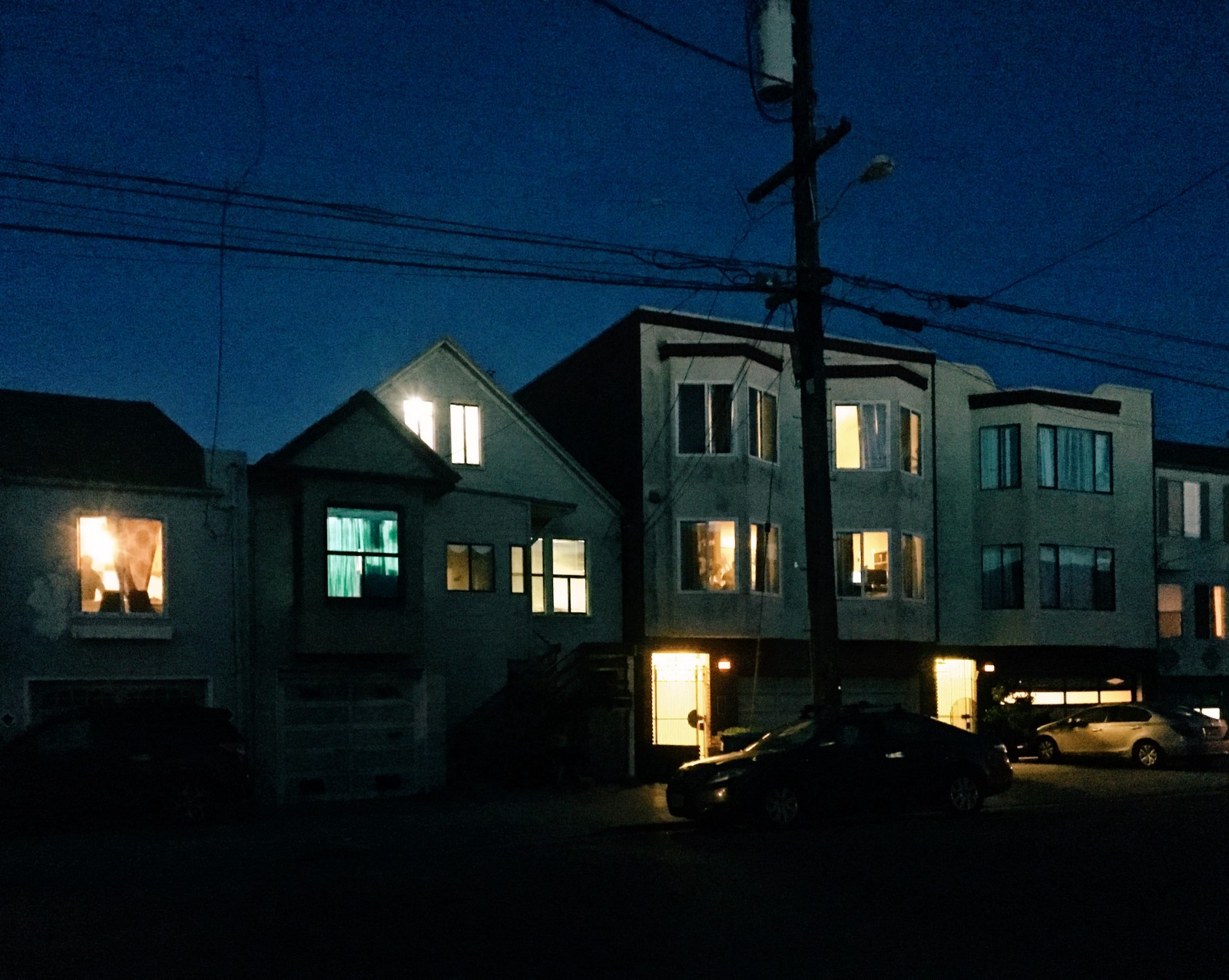 Todd Hido row of houses at night with lights on