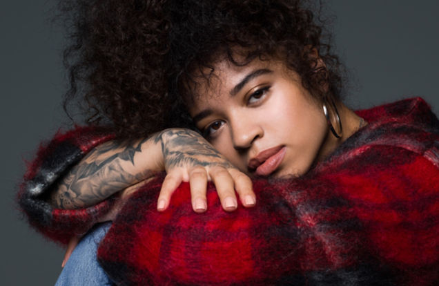 Ella Mai red plaid sitting