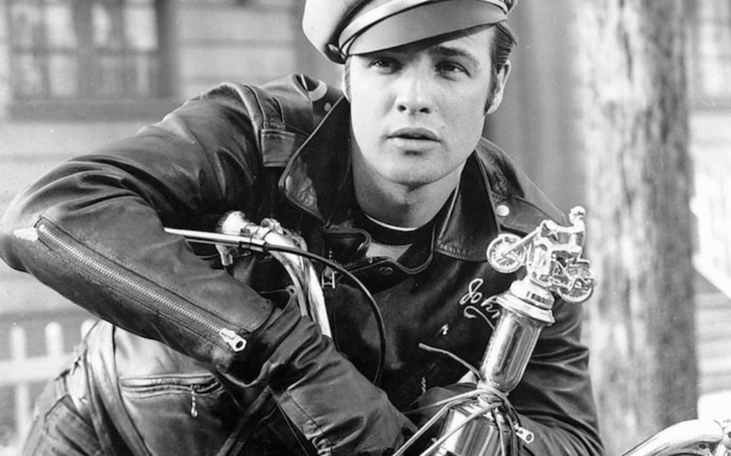 the classic photograph of Marlon Brando on his motorcycle wearing the coolest motorcycle jacket and cap