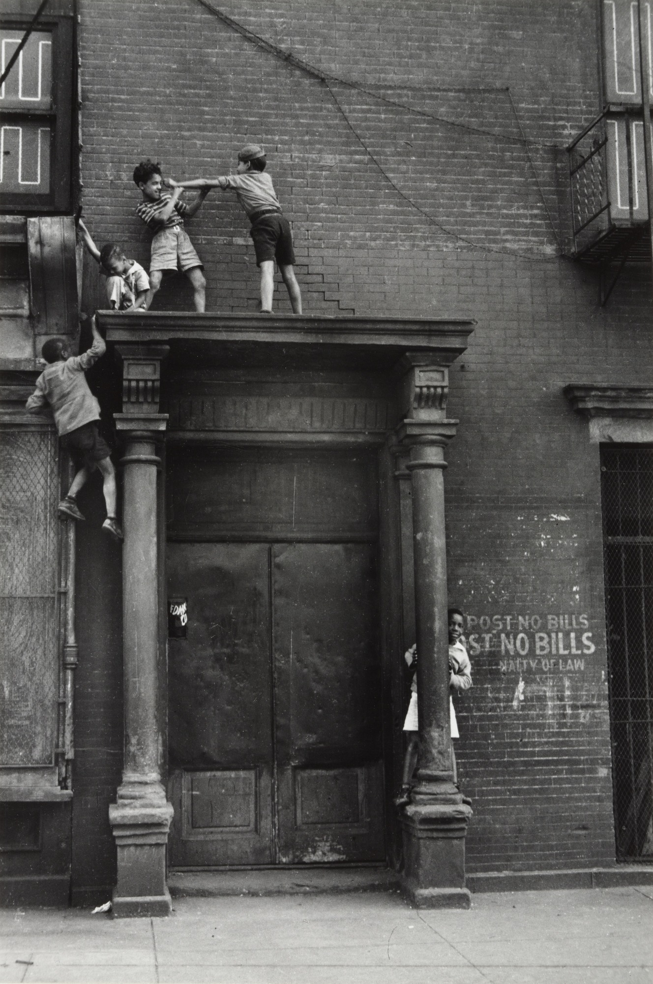 Boys play on rooftop in New York City Helen Levitt