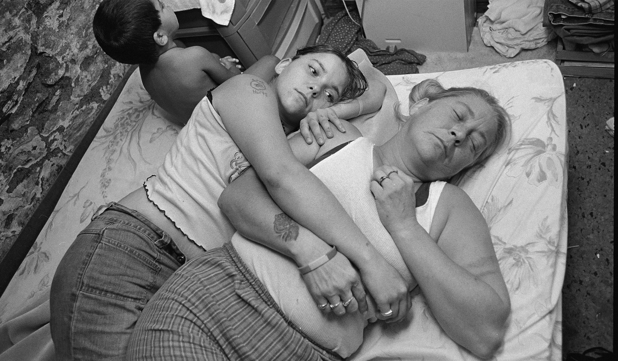 Family on a dirty mattress
