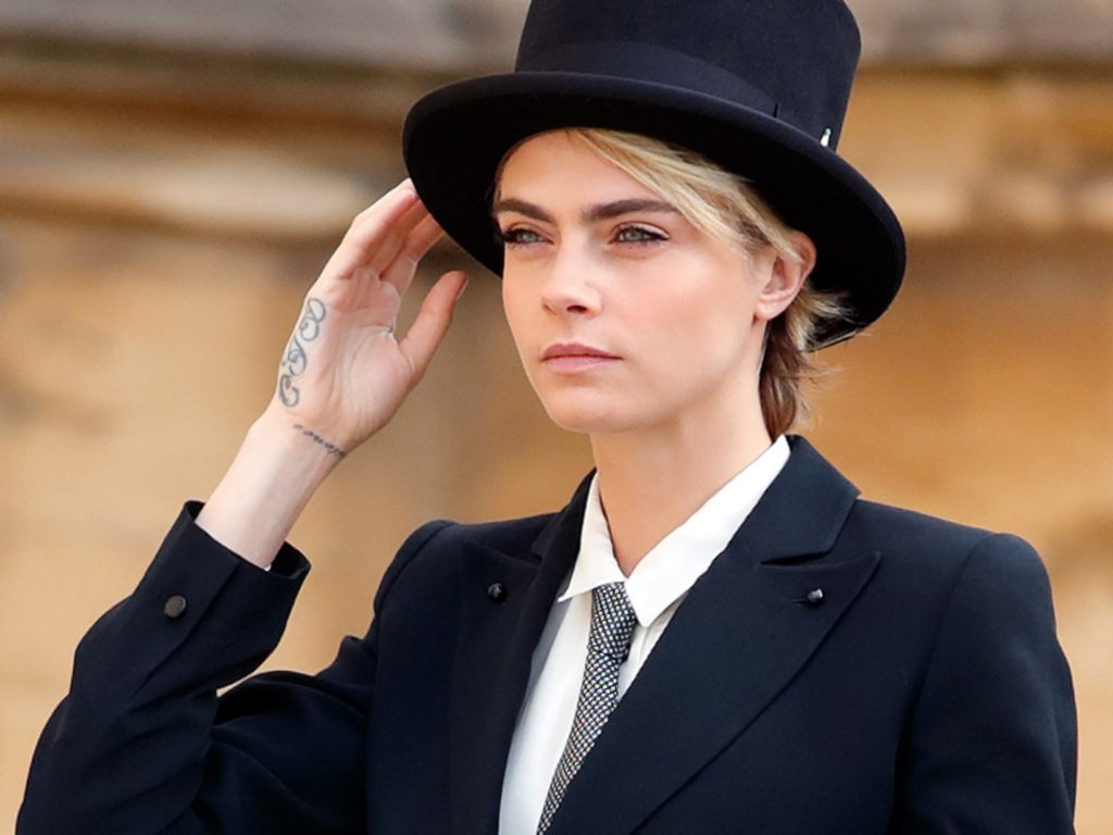 Cara Delevingne top hat tails royal wedding tuxedo
