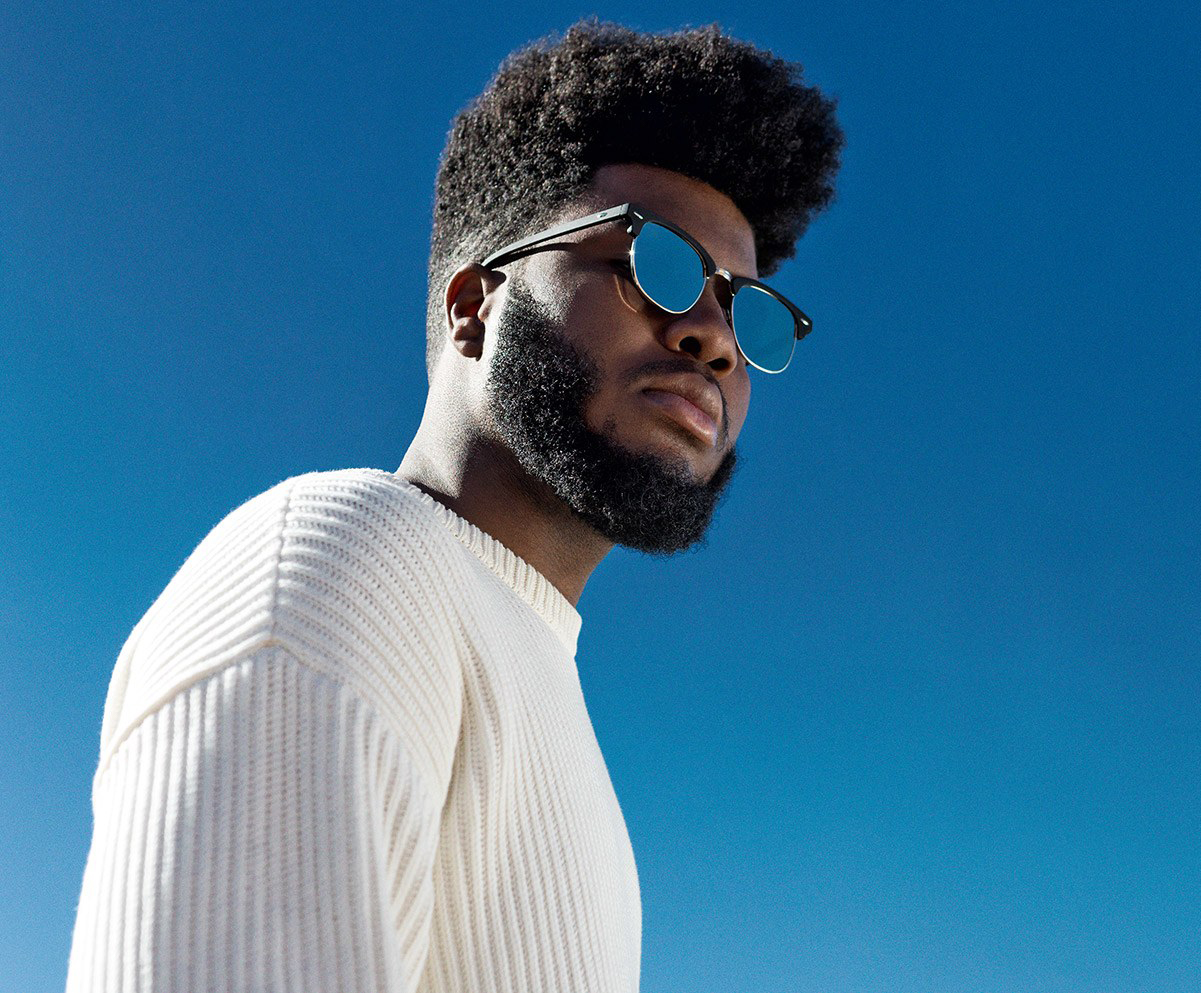 Khalid blue sky sunglasses white sweater