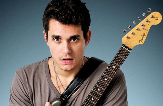 john mayer hugging guitar
