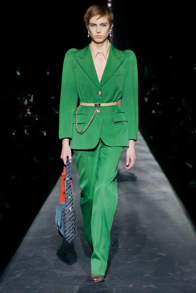 GIVENCHY COLLECTION FALL 2019 RUNWAY SHOW-MODEL WEARING A KELLY GREEN SUIT