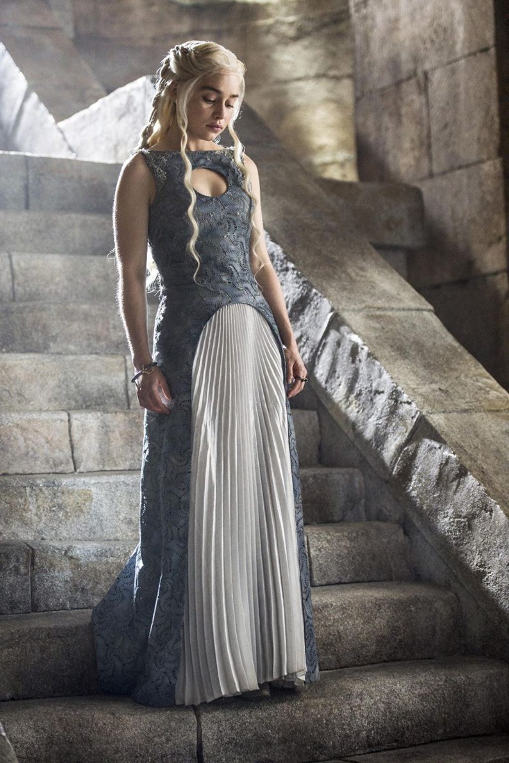 Game of Thrones Daenerys in a breathtaking dress standing on a long stone staircase