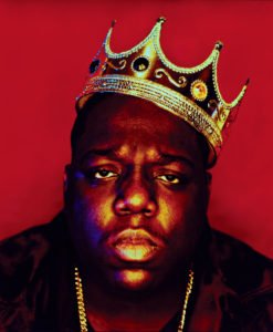 famous photograph of Biggie Smalls wearing a crown in front of a red background