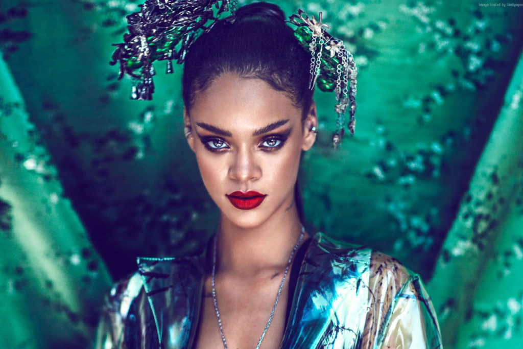 Rhianna against green background