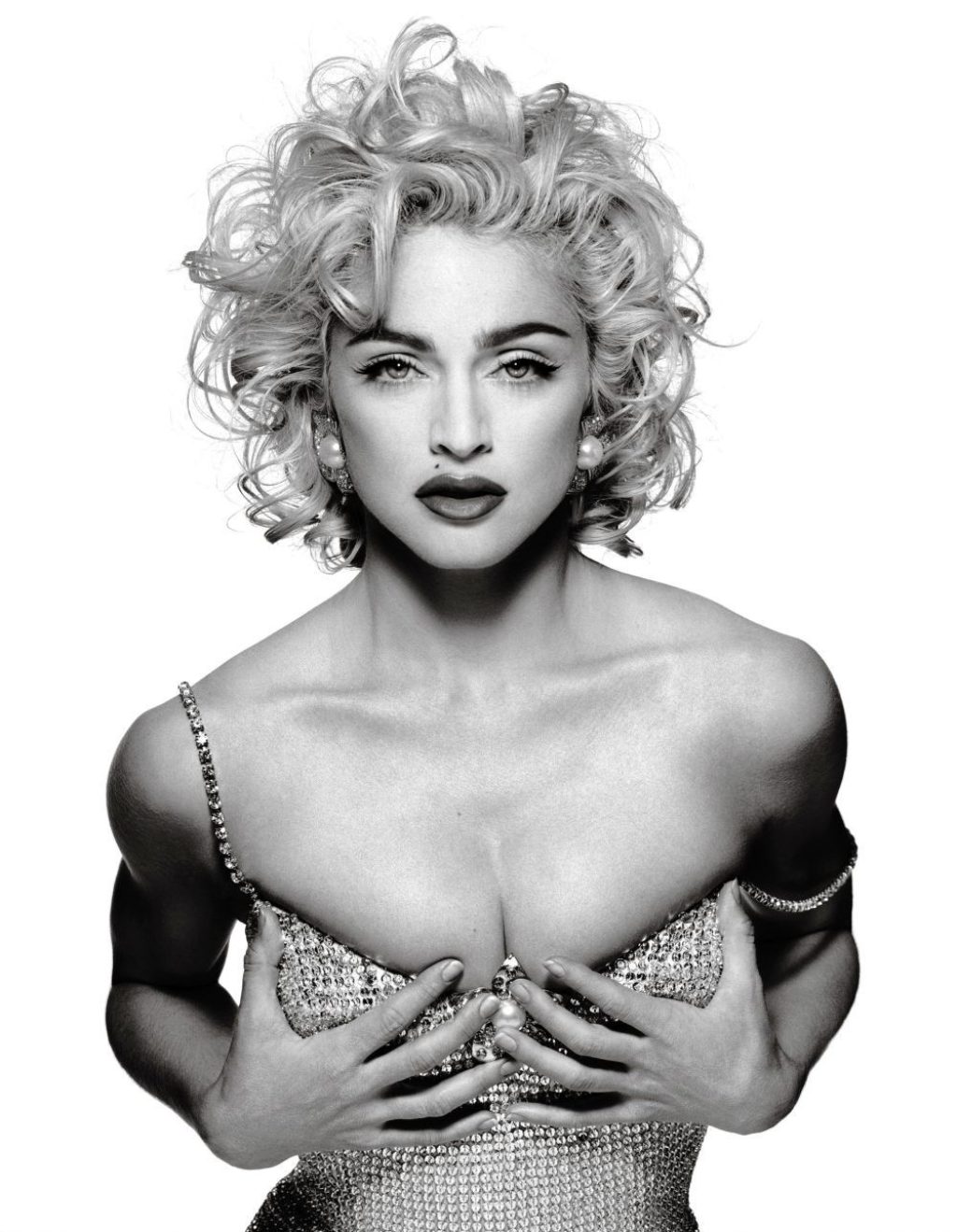 madonna holding her breasts shot by Patrick Demarchilier