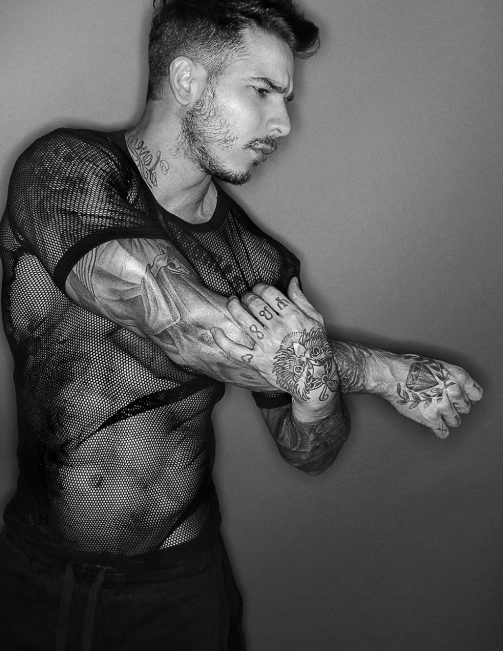 gay model diego decastro tatted up in fishnet tshirt