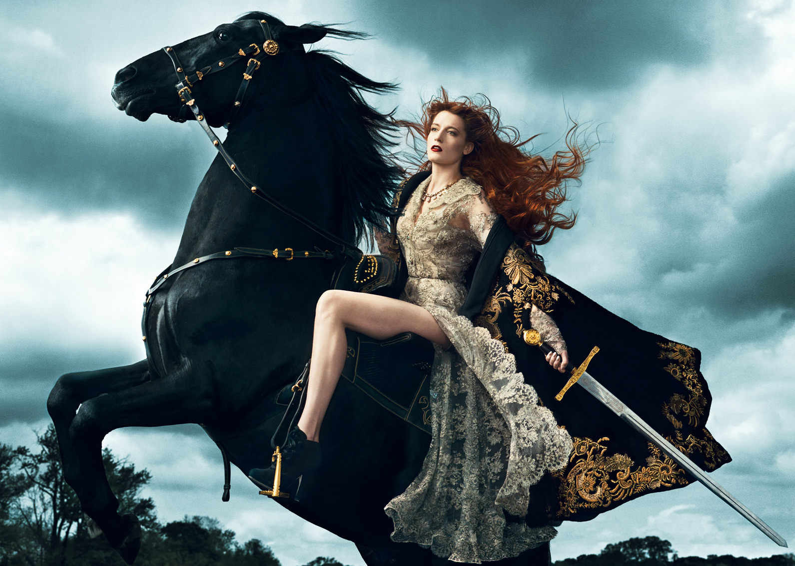 Florence and the machine with sword on horseback