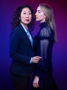 Killing Eve- Vilanelle wearing black sheer dress and Eve wearing navy suit