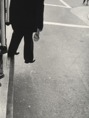 Man Stepping from Cable Car, San Francisco. 1956. Dorothea Lange, Courtesy The Museum of Modern Art, New York.