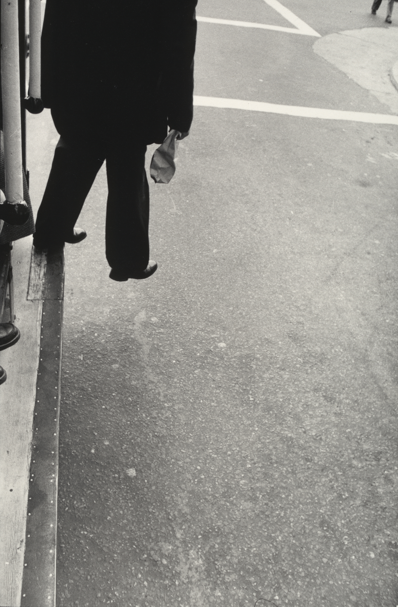 Man Stepping from Cable Car, San Francisco. 1956. Dorothea Lange, Courtesy The Museum of Modern Art, New York.