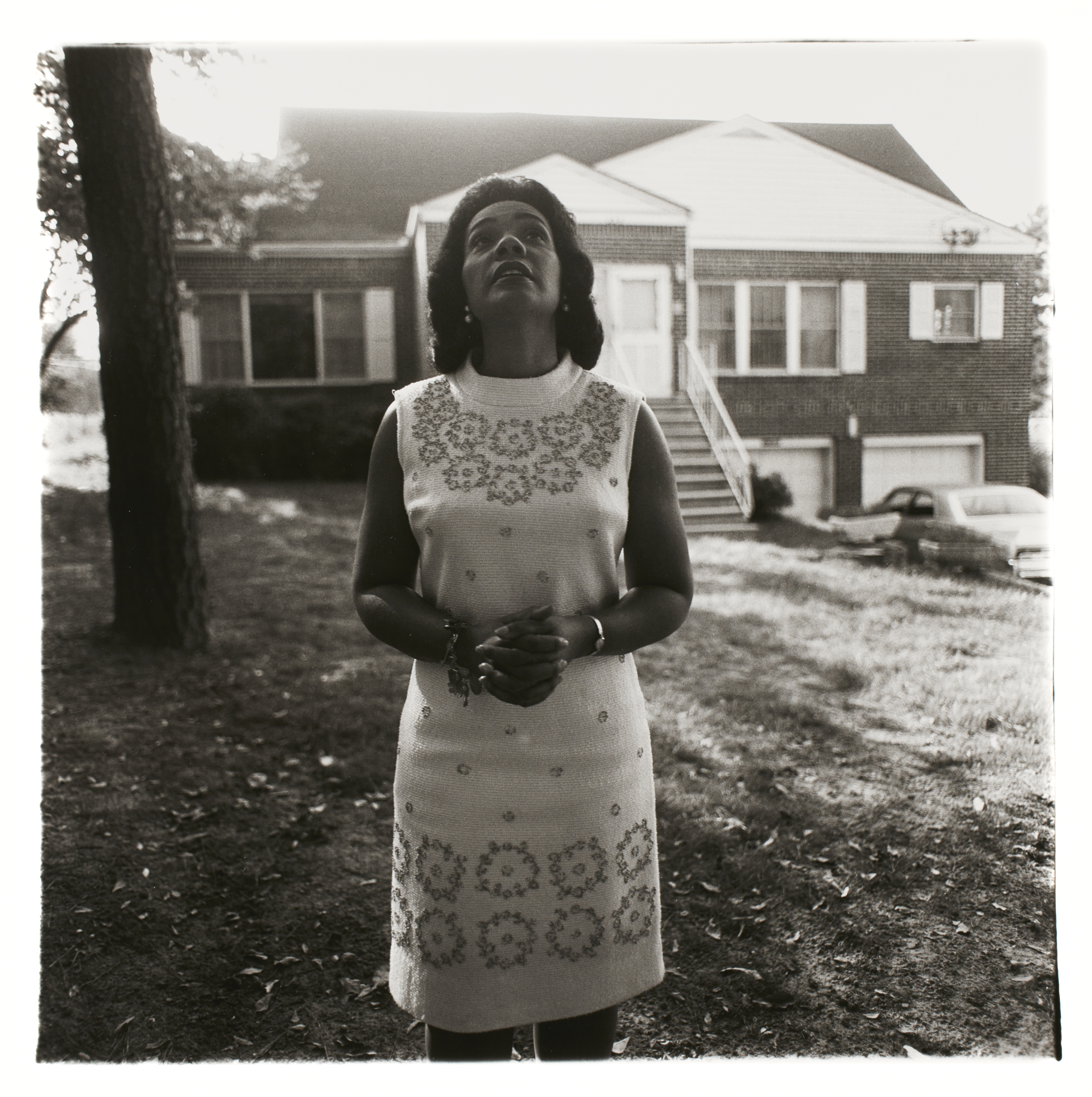 Arbus Mrs. Martin Luther King, Jr. on her front lawn, Atlanta, Ga., 1968