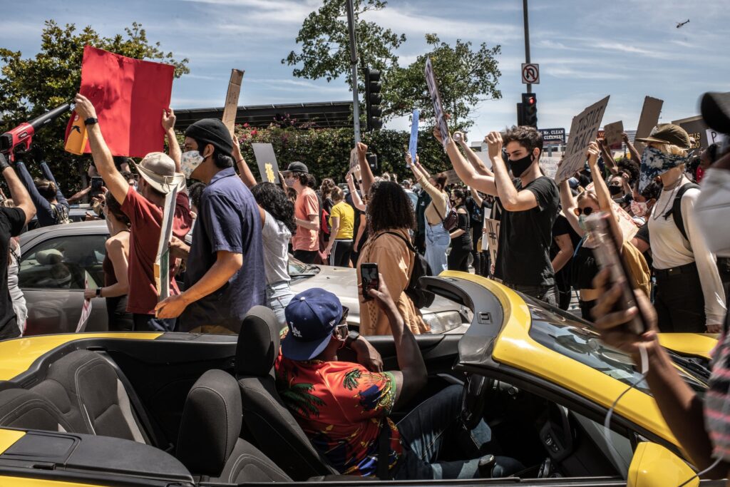 No Justice, No Peace marching in traffic