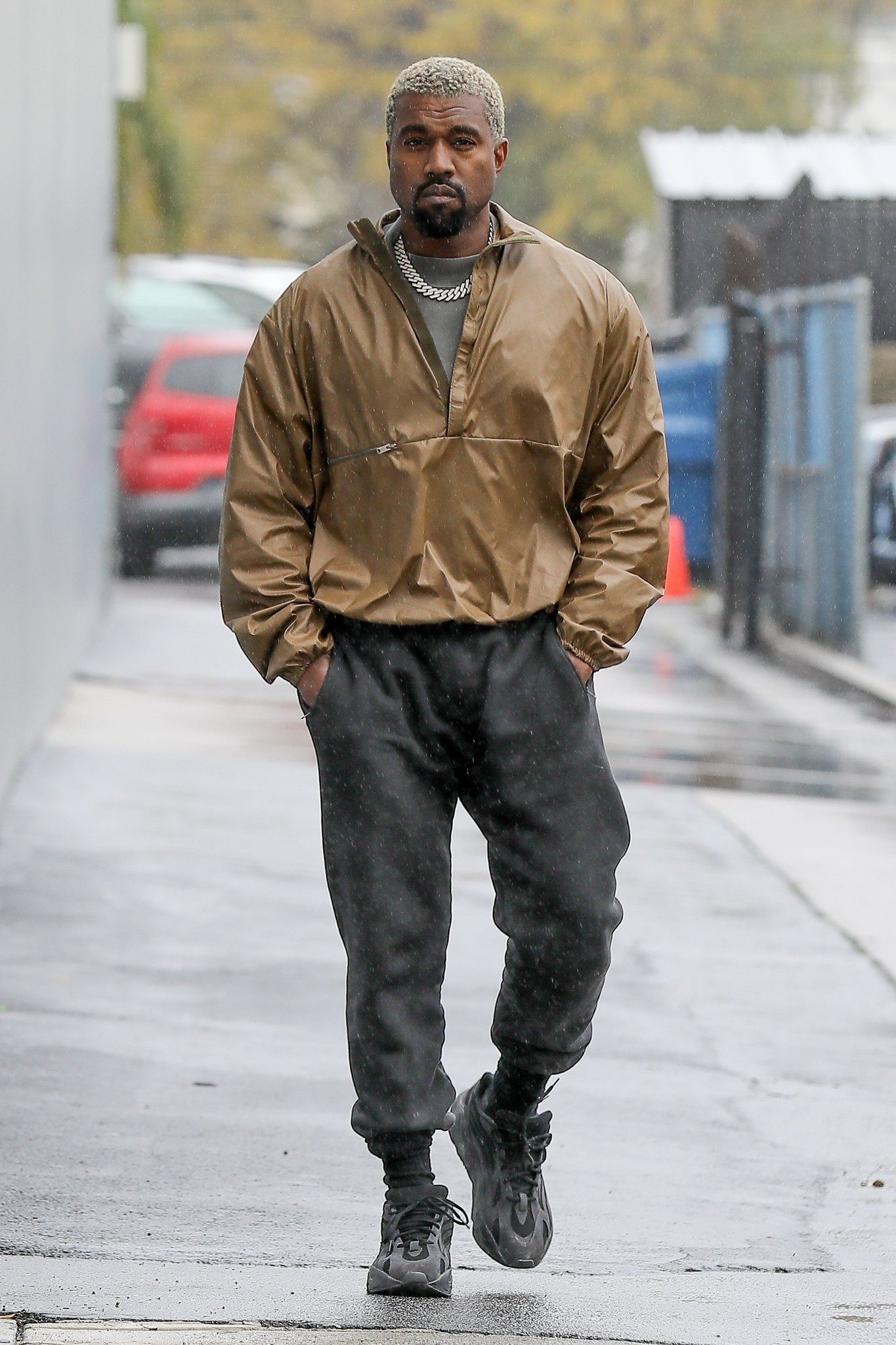 Kanye West walking down the street
