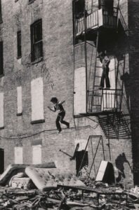 Martha Cooper Lower East Side [Boy Jumping from Fire Escape], 1978