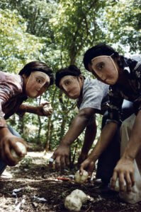 Susan Meiselas, Youths practice throwing contact bombs in forest surrounding Monimbo, 1978; printed later. Inkjet print on mesh. 26 1⁄2 x 39 3⁄4 in. Courtesy the artist. © Susan Meiselas/Magnum Photos