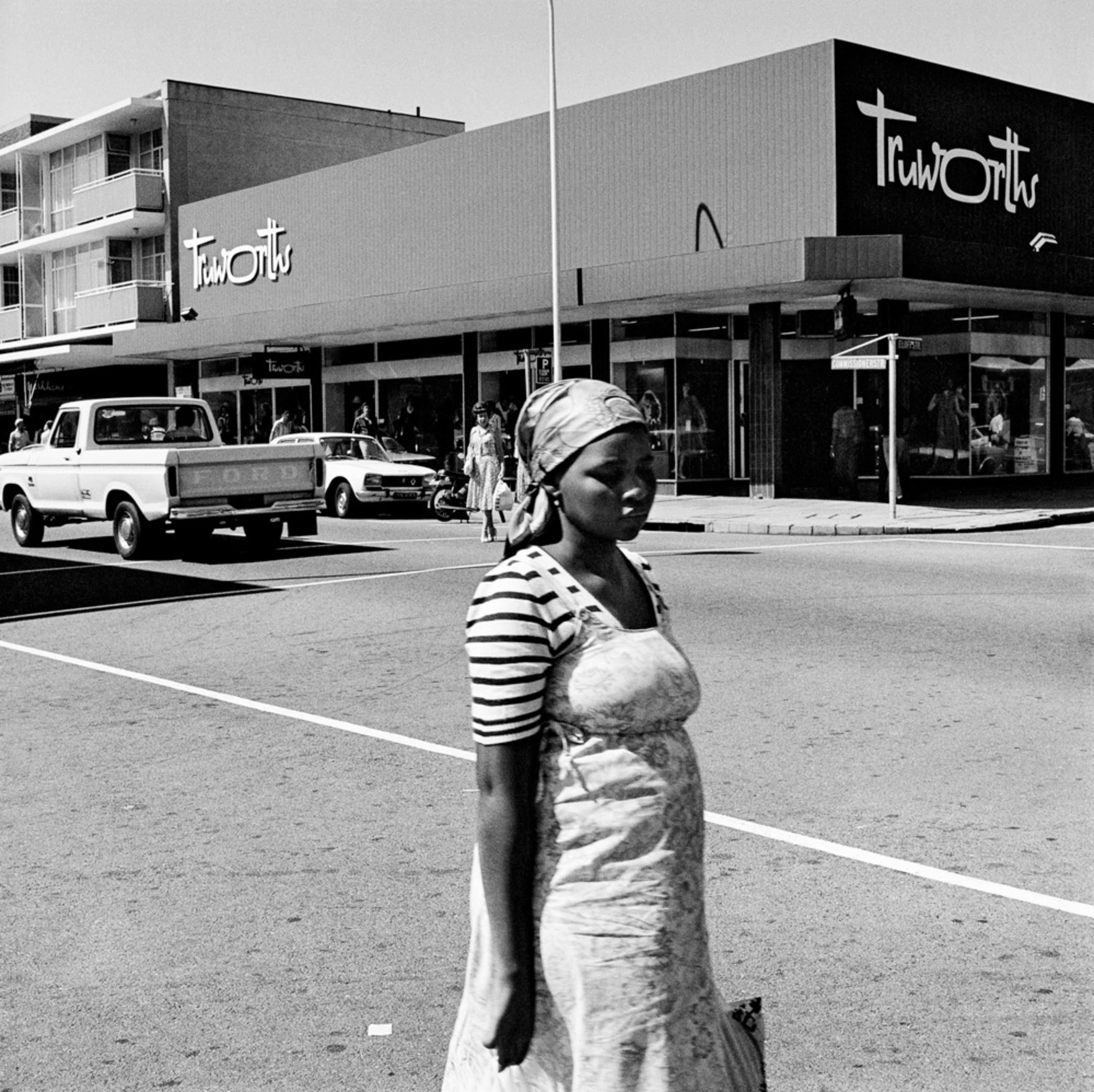 David Goldblatt On the corner of Commissioner and Eloff Streets, 1979 vintage gelatin silver hand print 11" × 11" (27.9 cm × 27.9 cm), image unique No. 76749 © The David Goldblatt Legacy Trust