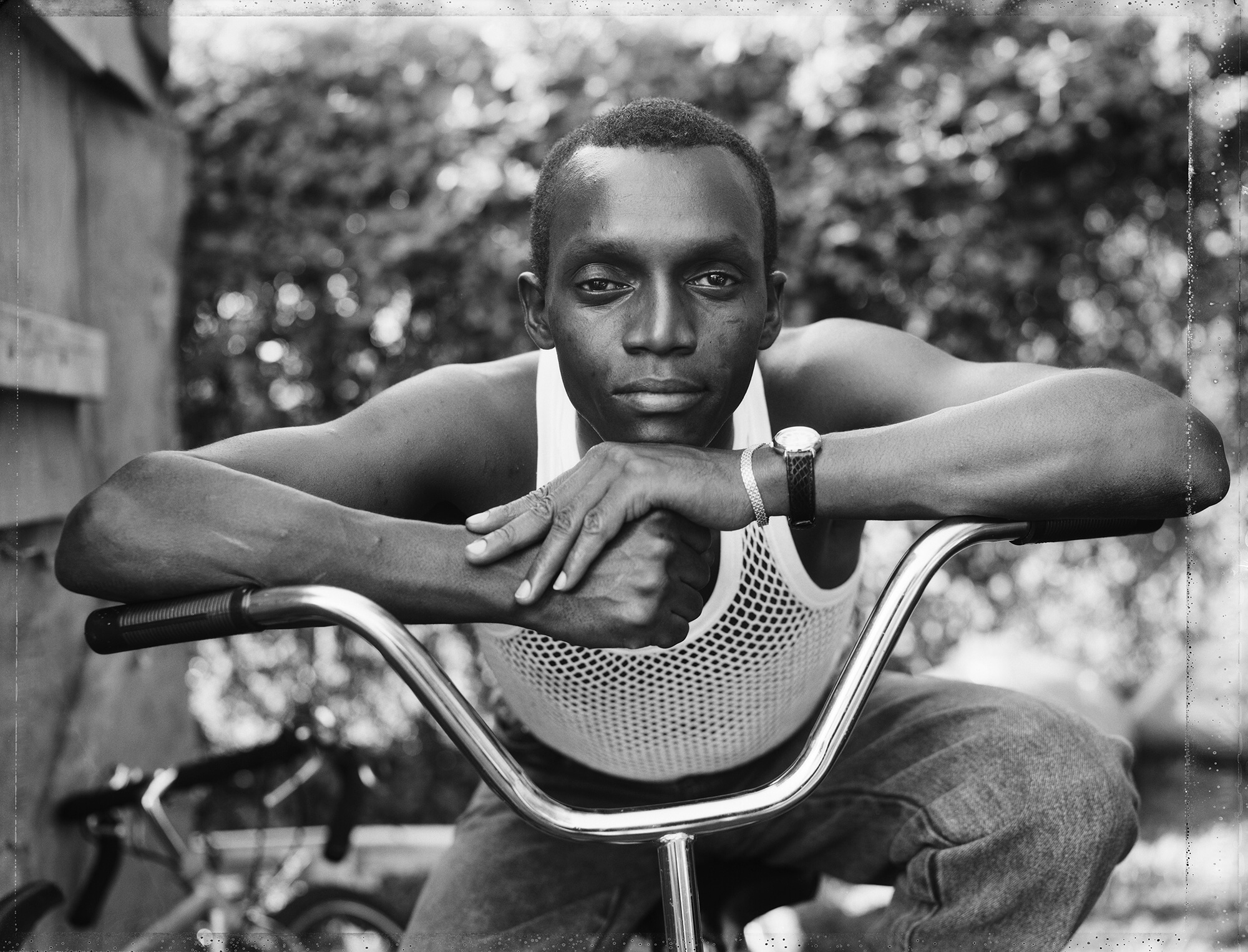 A Young Man Resting on an Exercise Bike, Amityville, NY, 1988 Pigmented inkjet print (printed 2019) Collection of the artist; courtesy Sean Kelly Gallery, New York; Stephen Daiter Gallery, Chicago; and Rena Bransten Gallery, San Francisco
